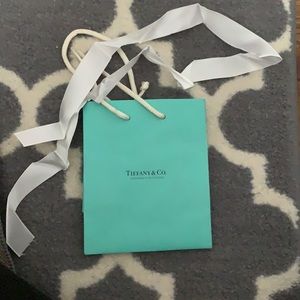 Small Tiffany and Co. shopping bag with ribbon